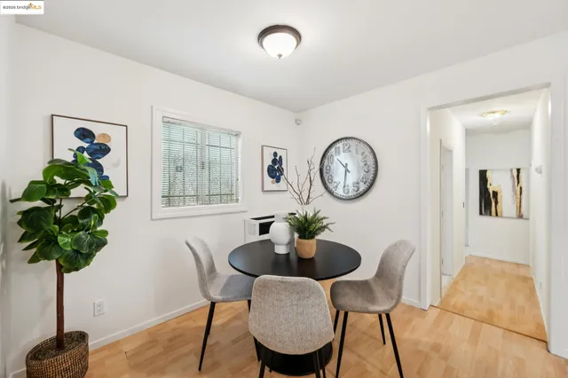 a table and a vase with flowers on a table