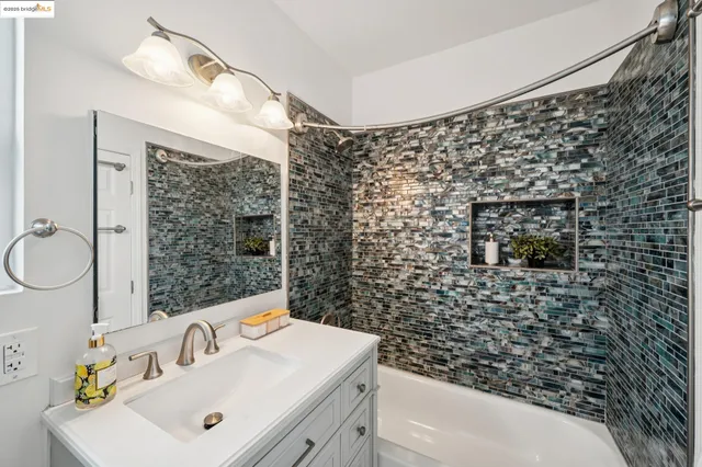 a bathroom with a sink and a shower