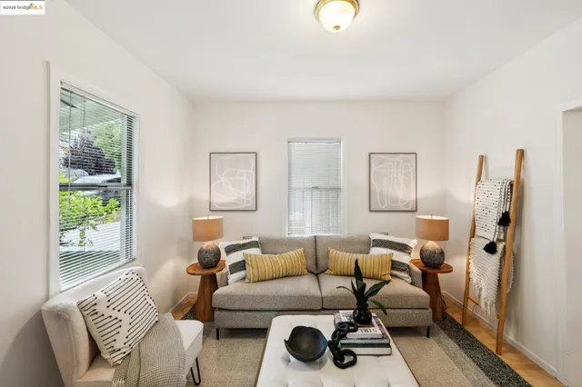 a bedroom with furniture and a window