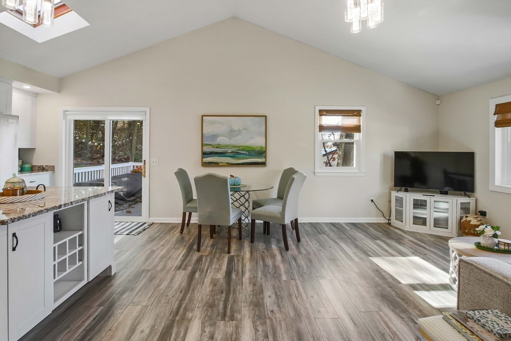 96 Indian Hill Road Worcester, MA 01606 - Photo 11 of 42 a view of a dining room with furniture window and wooden floor
