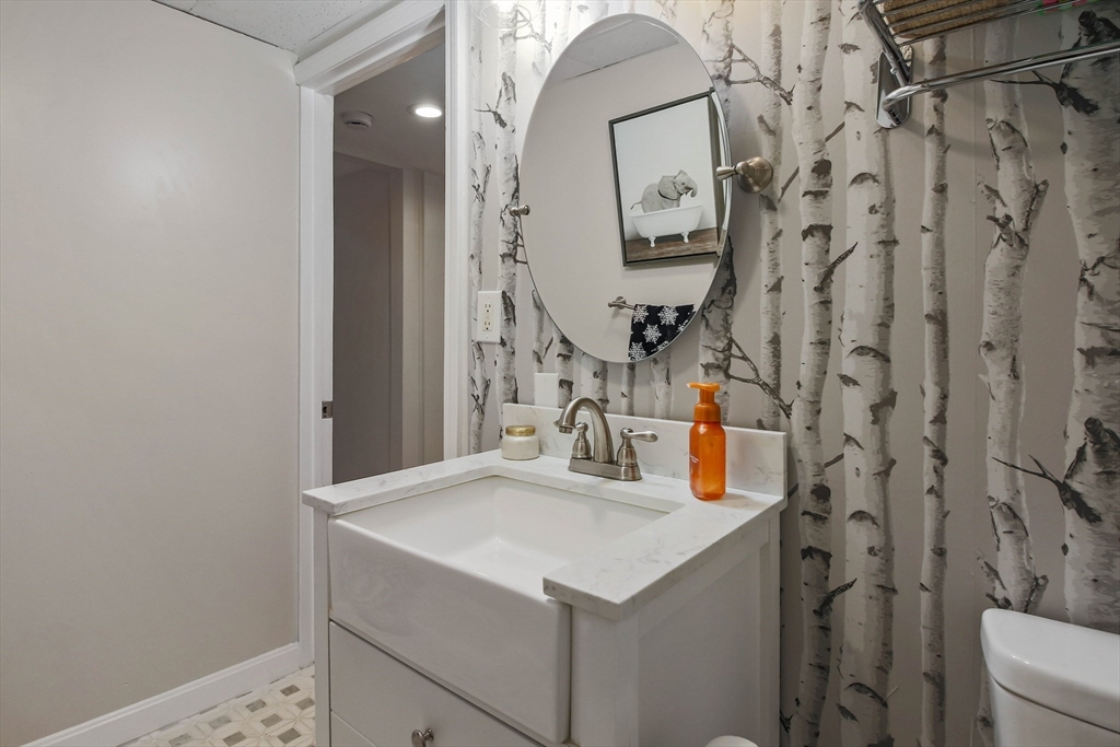 96 Indian Hill Road Worcester, MA 01606 - Photo 34 of 42 a bathroom with a sink vanity and a mirror