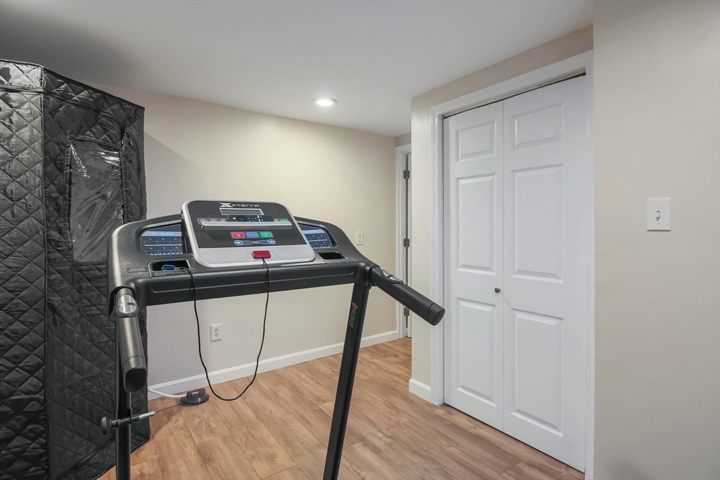 96 Indian Hill Road Worcester, MA 01606 - Photo 36 of 42 a view of a hallway with workspace
