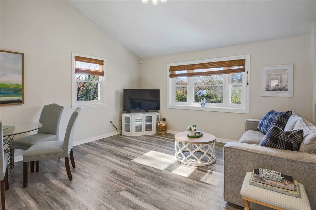 96 Indian Hill Road Worcester, MA 01606 - Photo 4 of 42 a living room with furniture and a flat screen tv