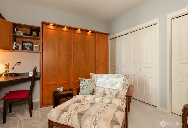 a bedroom with a bed and furniture