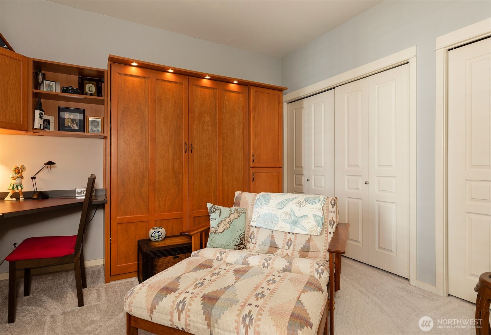 2000 Alaskan Way, Unit 255 Seattle, WA 98121 - Photo 19 of 31 a bed room with a bed and a chair