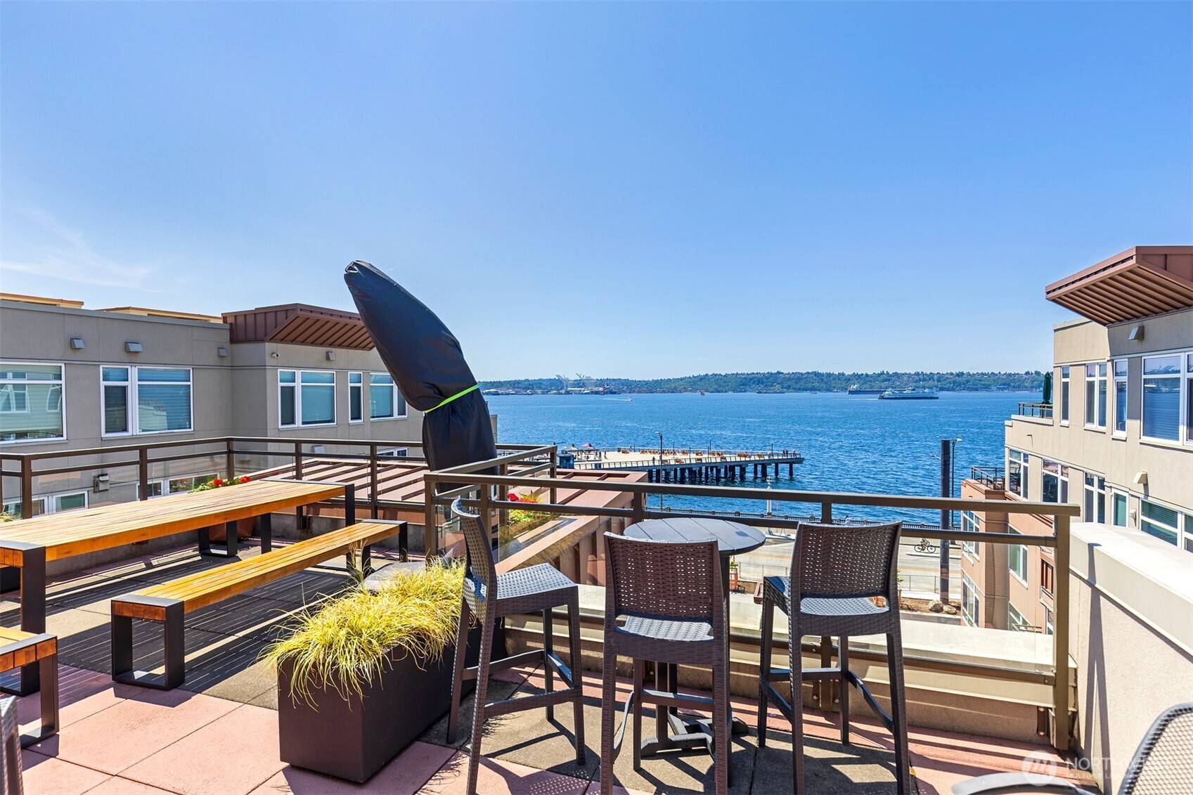 2000 Alaskan Way, Unit 255 Seattle, WA 98121 - Photo 27 of 31 a view of a chairs and table on the terrace