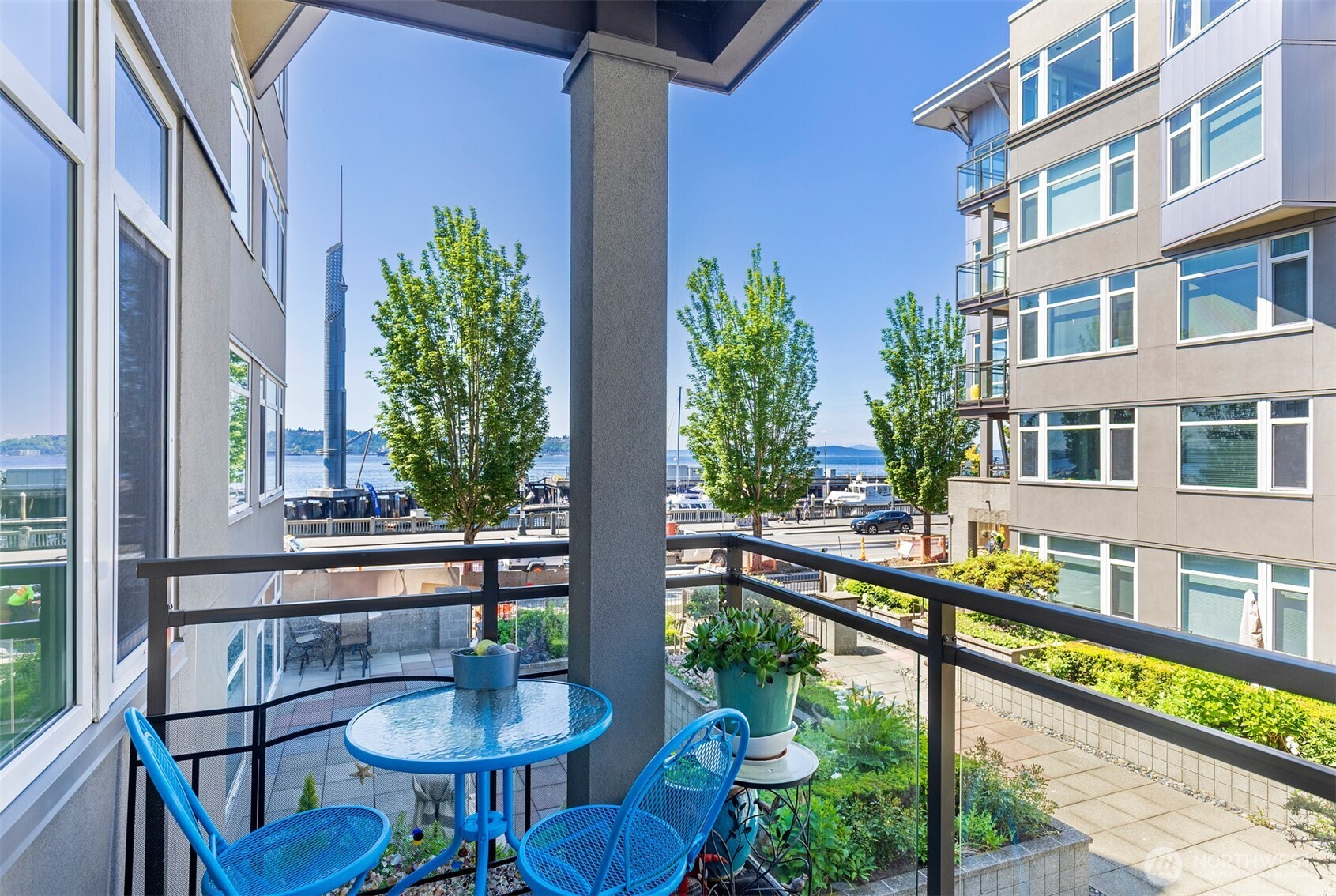 2000 Alaskan Way, Unit 255 Seattle, WA 98121 - Photo 3 of 31 a view of a balcony with chairs and a potted plant