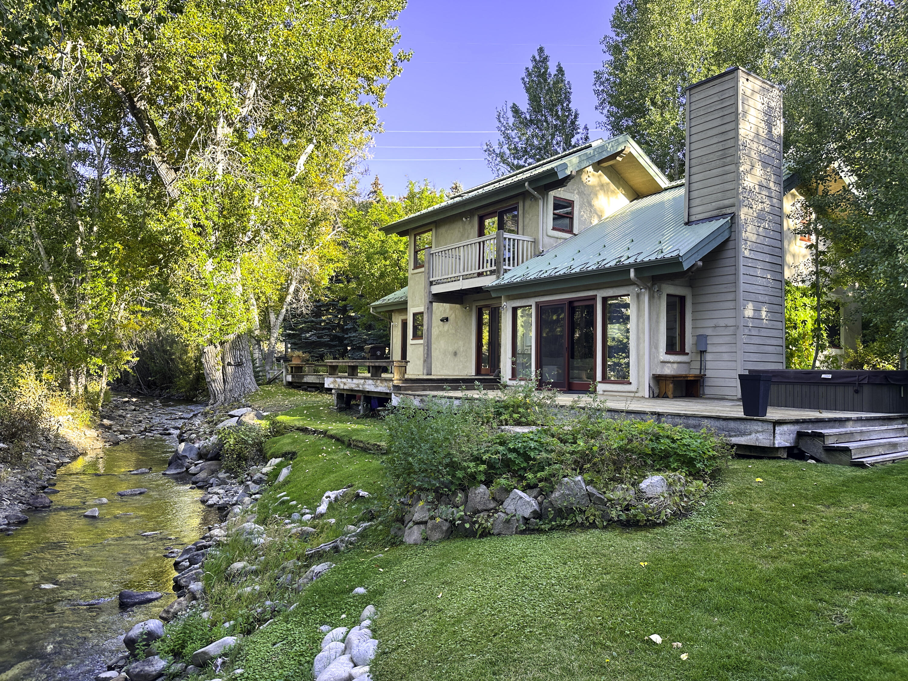 233 Timberline Road Blaine County, ID 83333 - Photo 1 of 25 Back of home with River.