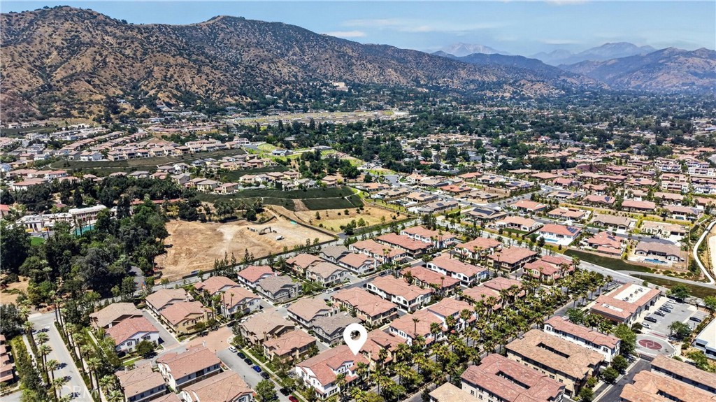 849 The Promenade, Unit D Azusa, CA 91702 - Photo 37 of 37 an aerial view of residential houses with outdoor space