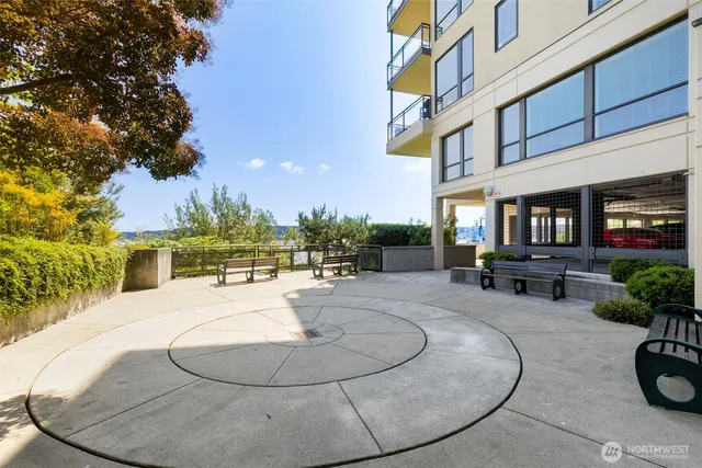 a view of a swimming pool with sitting area