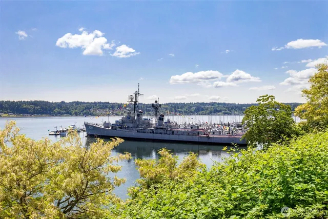 a view of a swimming pool with a lake view