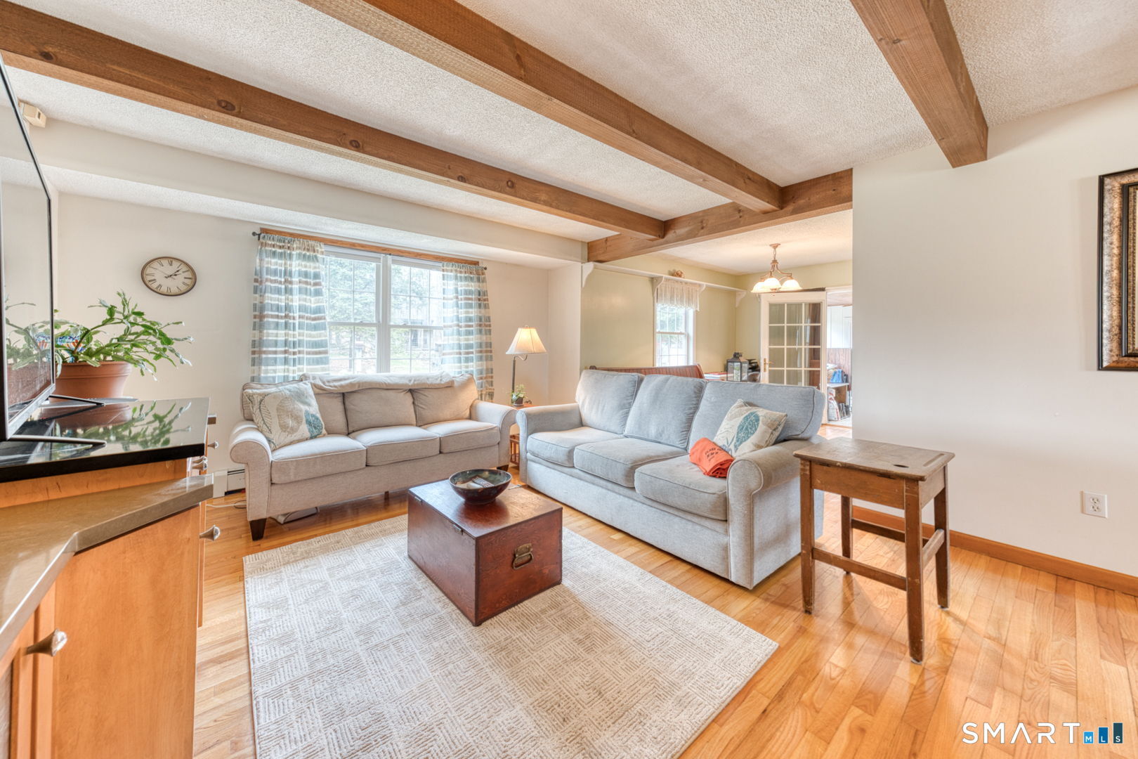 454 Providence Turnpike Hampton, CT 06247 - Photo 17 of 40 a living room with furniture and wooden floor