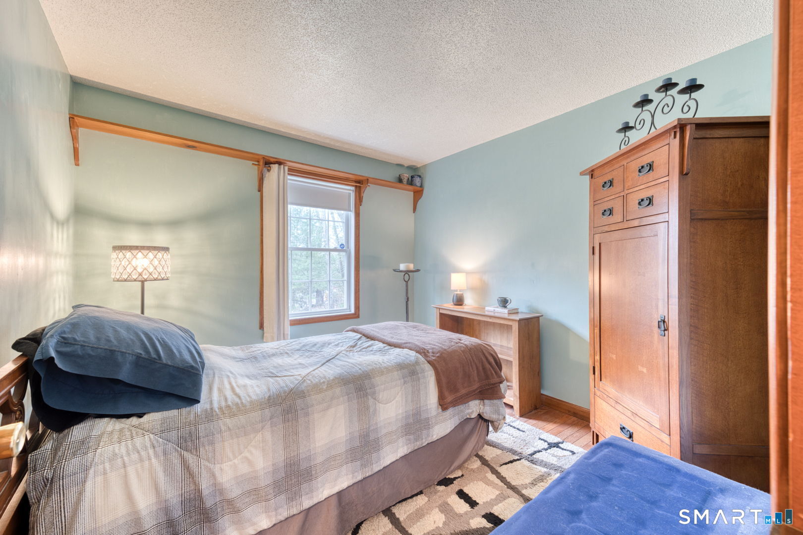 454 Providence Turnpike Hampton, CT 06247 - Photo 18 of 40 a bedroom with a bed and a mirror