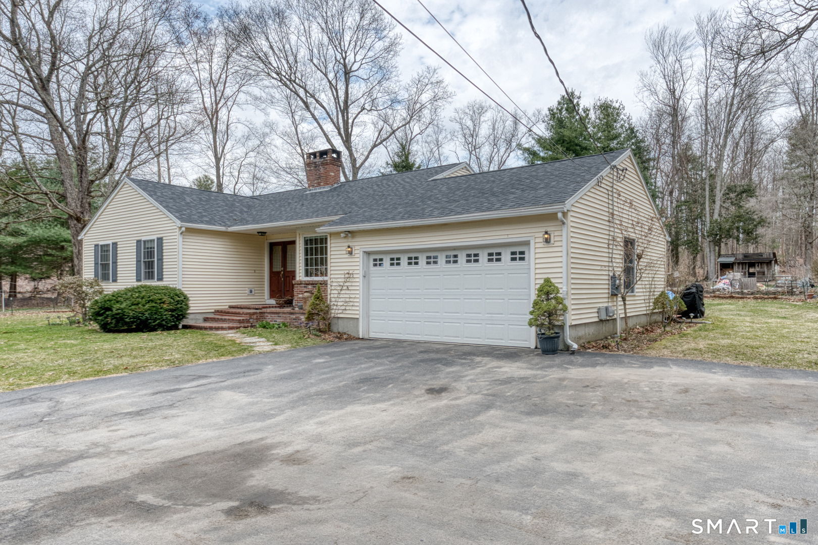 454 Providence Turnpike Hampton, CT 06247 - Photo 2 of 40 a view of a house with a yard and garage