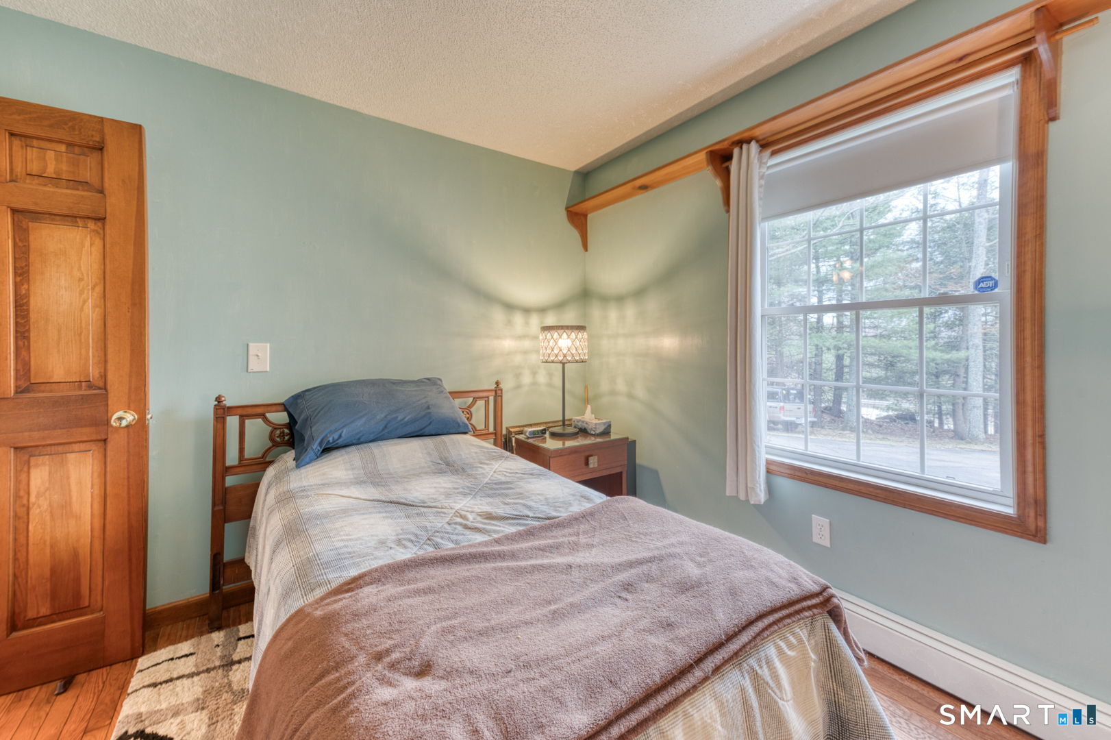 454 Providence Turnpike Hampton, CT 06247 - Photo 32 of 40 a bedroom with a large bed and a large window