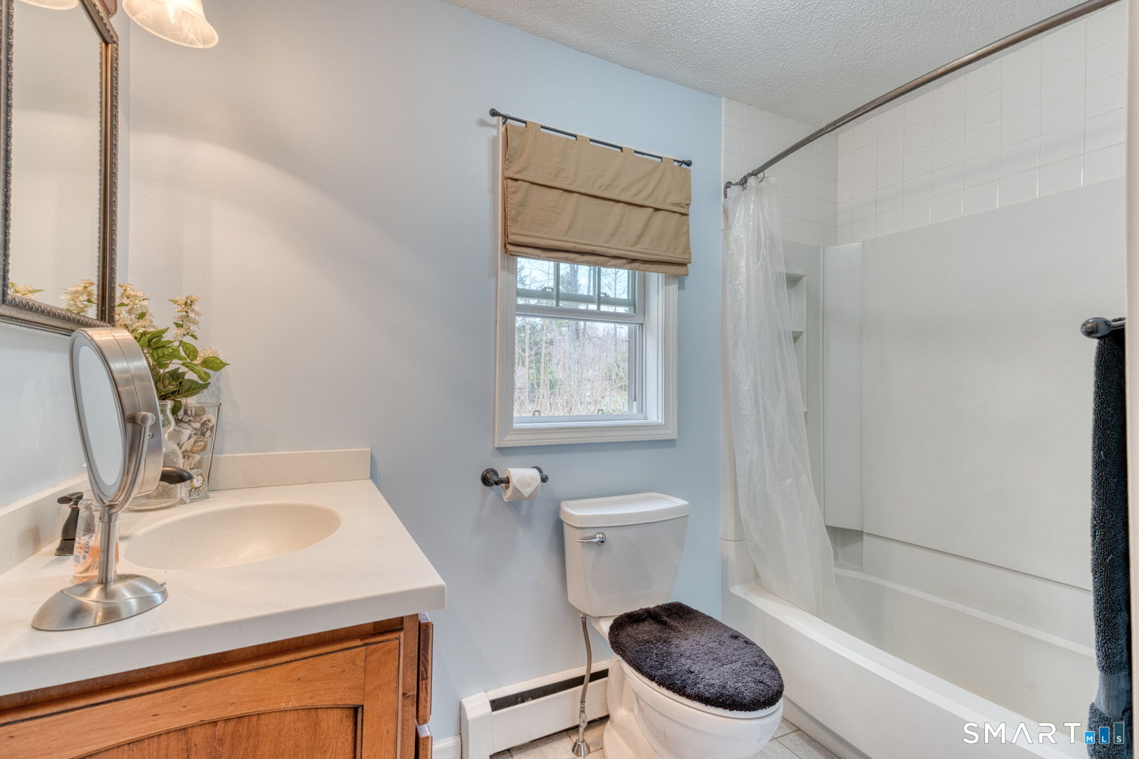 454 Providence Turnpike Hampton, CT 06247 - Photo 34 of 40 a bathroom with a sink toilet and shower