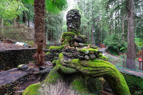 a backyard of a house with lots of green space