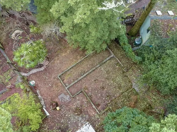 a backyard of a house with lots of green space