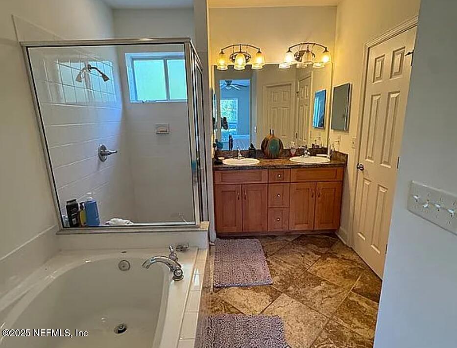 159 Old Starke Road Palatka, FL 32177 - Photo 11 of 13 a bathroom with a tub sink and mirror