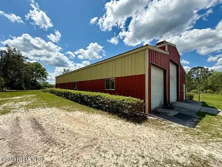 159 Old Starke Road Palatka, FL 32177 - Photo 3 of 13 a front view of house with yard and green space