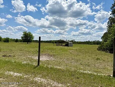159 Old Starke Road Palatka, FL 32177 - Photo 6 of 13 a view of a lake with a big yard