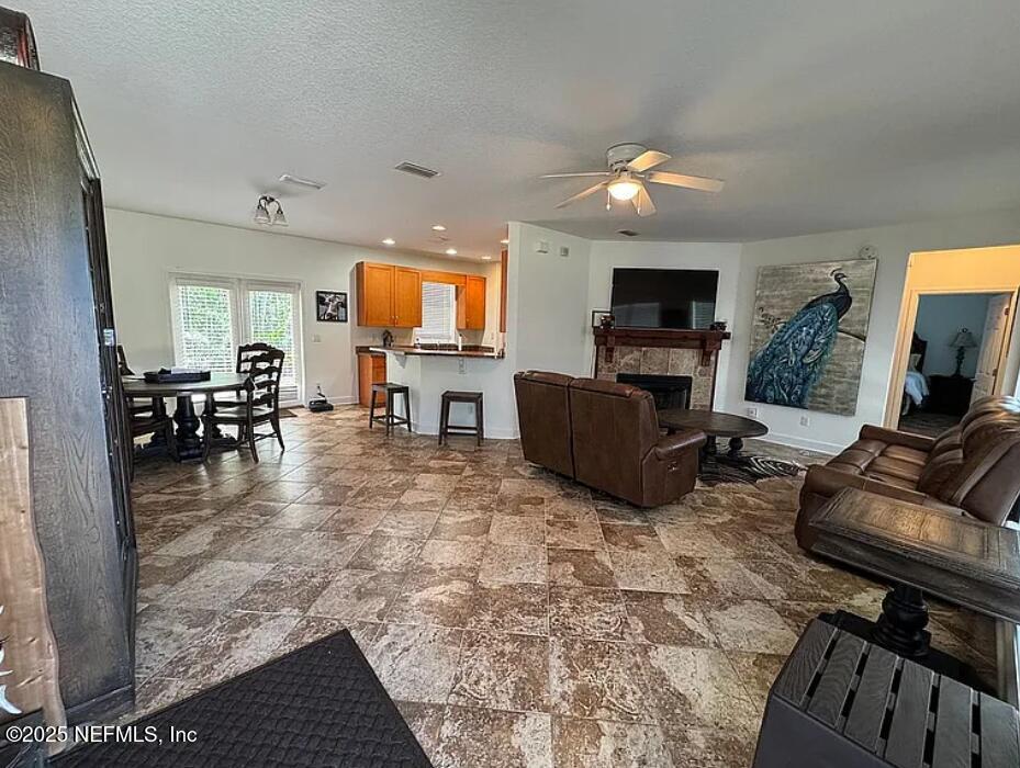 159 Old Starke Road Palatka, FL 32177 - Photo 8 of 13 a living room with furniture and a flat screen tv