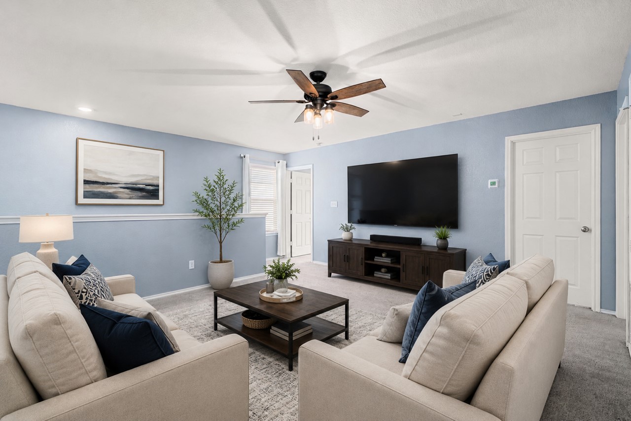 340 Harper Lane Georgetown, TX 78626 - Photo 13 of 28 Living area featuring a ceiling fan with integrated lighting, recessed lighting, and a dedicated media wall. Ai generated photo.