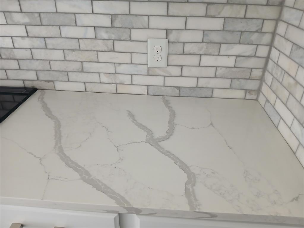 8045 Ballater Drive Fort Worth, TX 76123 - Photo 17 of 26 Kitchen view of light stone counters