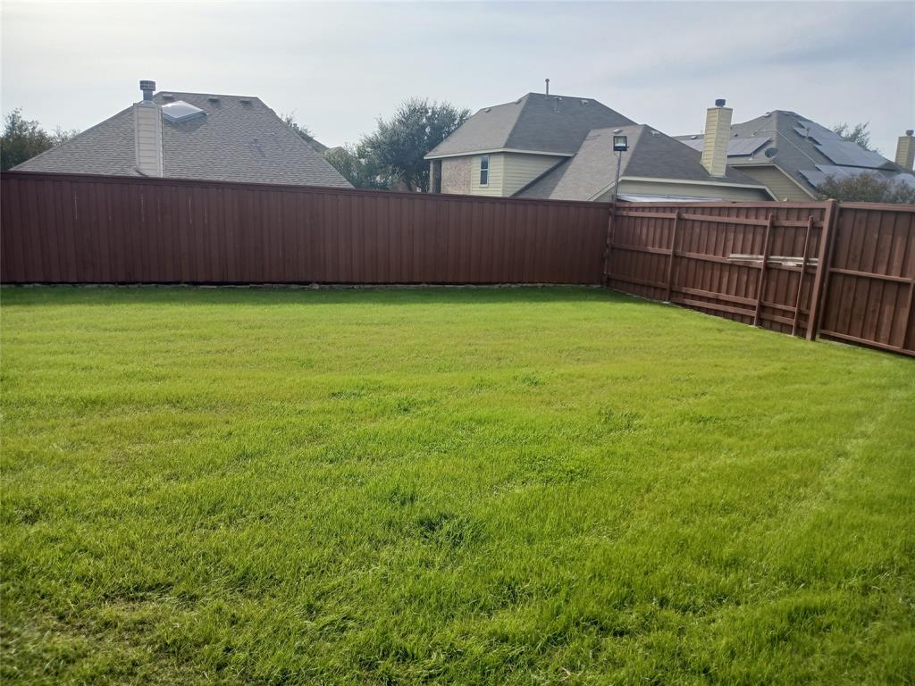 8045 Ballater Drive Fort Worth, TX 76123 - Photo 18 of 26 View of fenced backyard