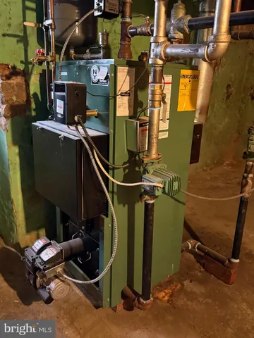 a view of a brick wall and window