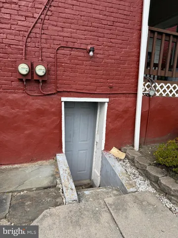 a view of a porch with wooden floor outdoor seating