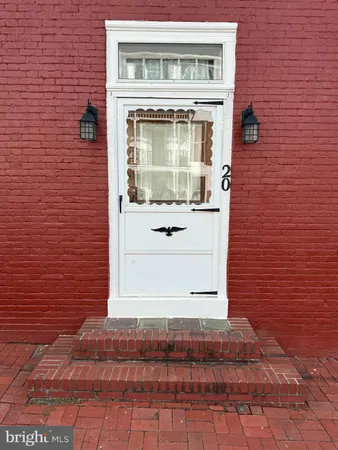 a front view of a house with a door