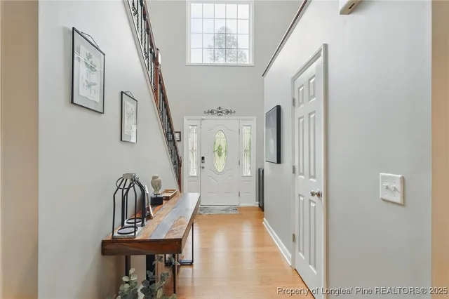 a view of a hallway with seating area