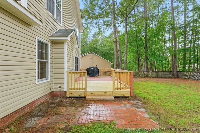 a view of a back yard with a house