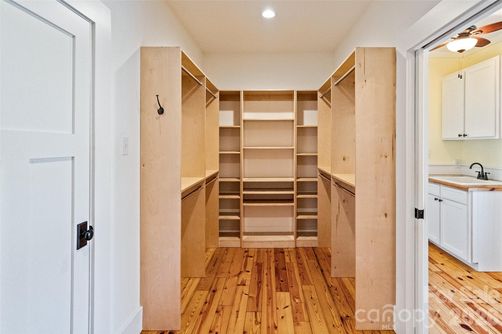 2370 Killian Road Edgemoor, SC 29712 - Photo 16 of 45 a view of closet area with empty racks