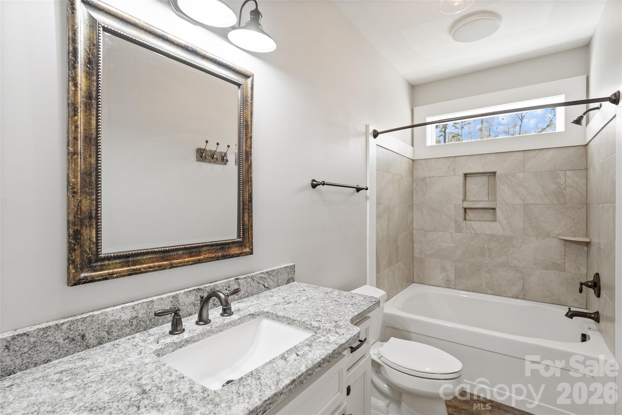 2370 Killian Road Edgemoor, SC 29712 - Photo 20 of 45 a bathroom with a granite countertop sink toilet and shower