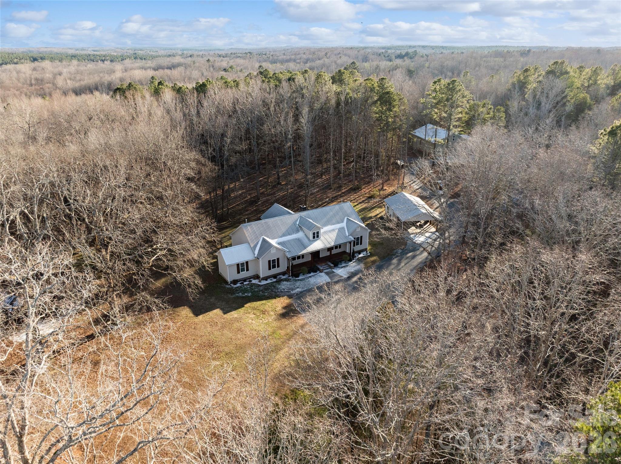 2370 Killian Road Edgemoor, SC 29712 - Photo 4 of 45 a view of a forest with a yard
