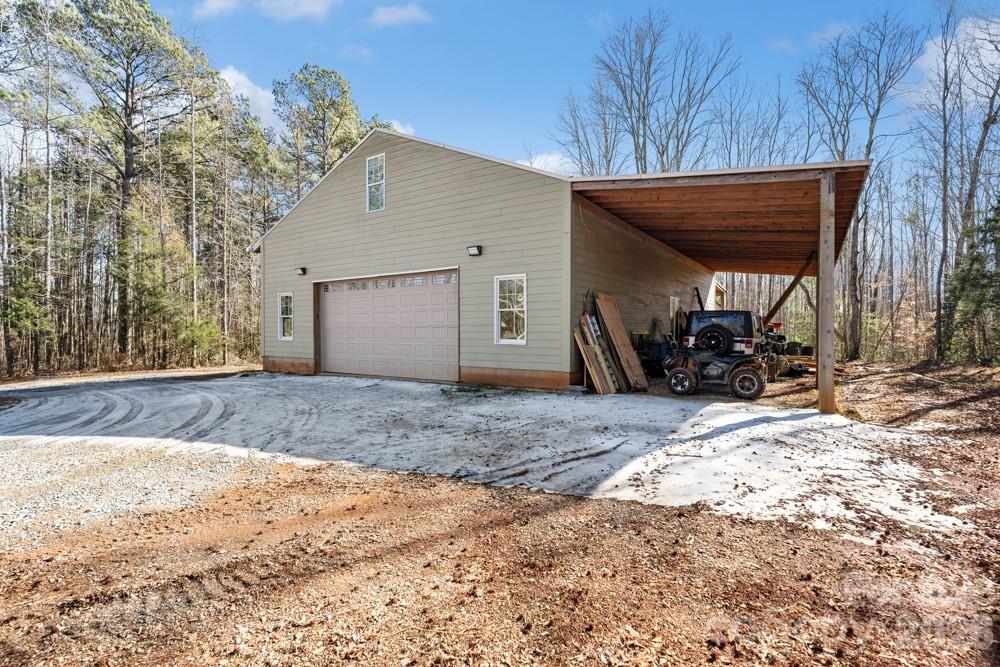 2370 Killian Road Edgemoor, SC 29712 - Photo 42 of 45 a view of a house with a yard covered in snow
