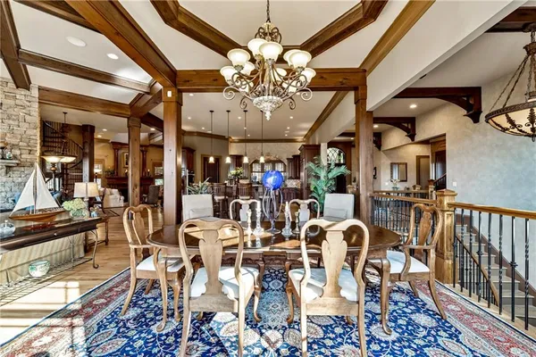 a large spacious bathroom with a tub and a large mirror