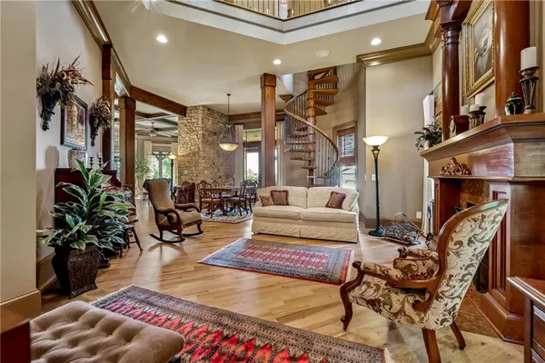 a kitchen with sink stove and cabinets