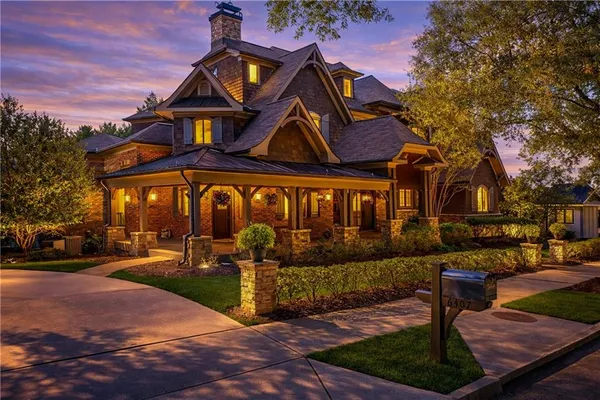 a view of a patio with a table and chairs