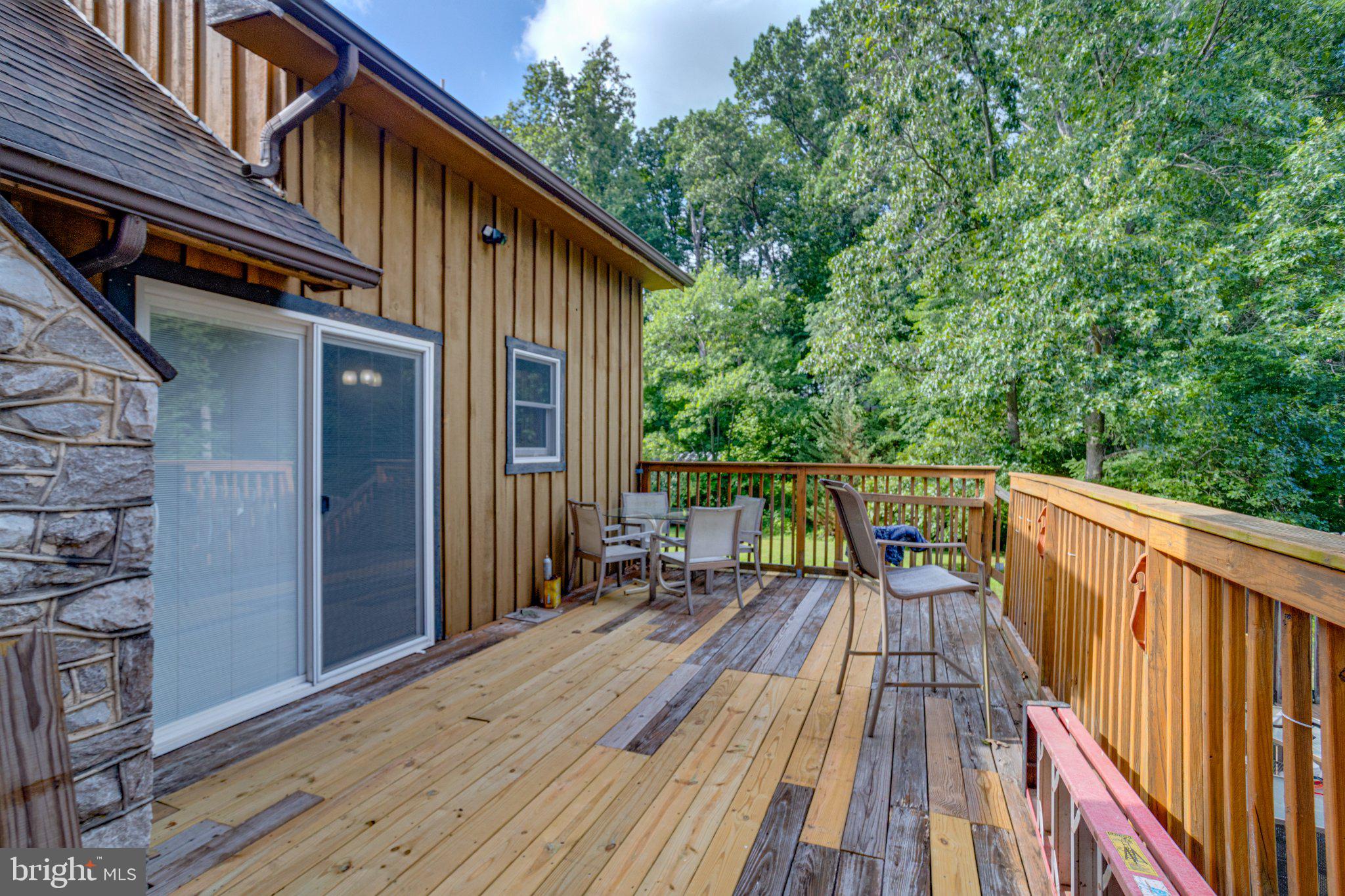 10 Clubhouse Road Delta, PA 17314 - Photo 48 of 70 Serene deck overlooking lush greenery.