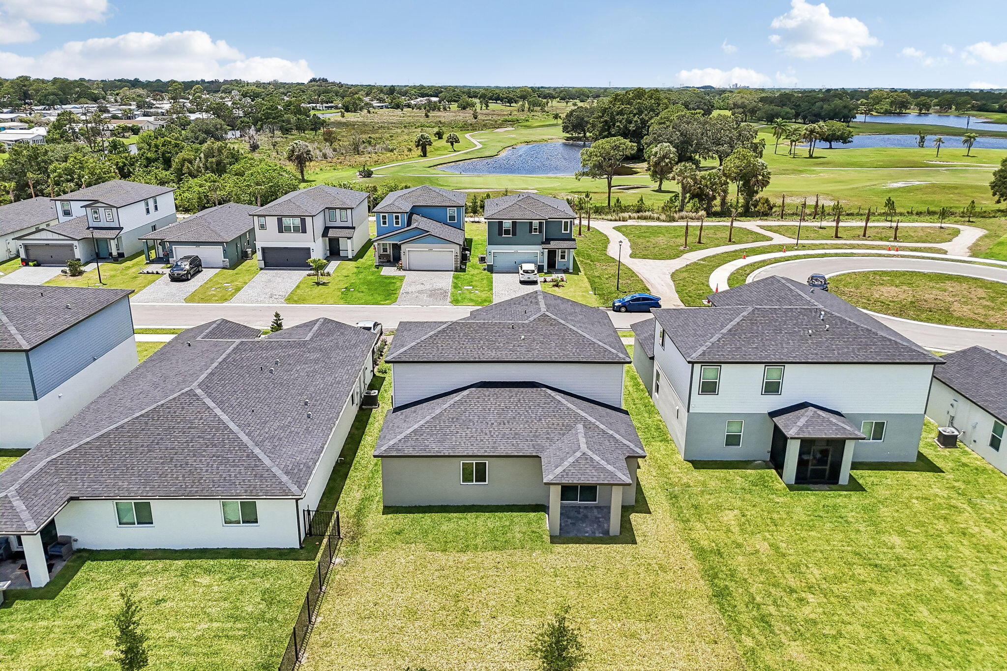 14211 Southwest New Dawn Road Indiantown, FL 34956 - Photo 34 of 37 an aerial view of a house with a swimming pool yard and outdoor seating