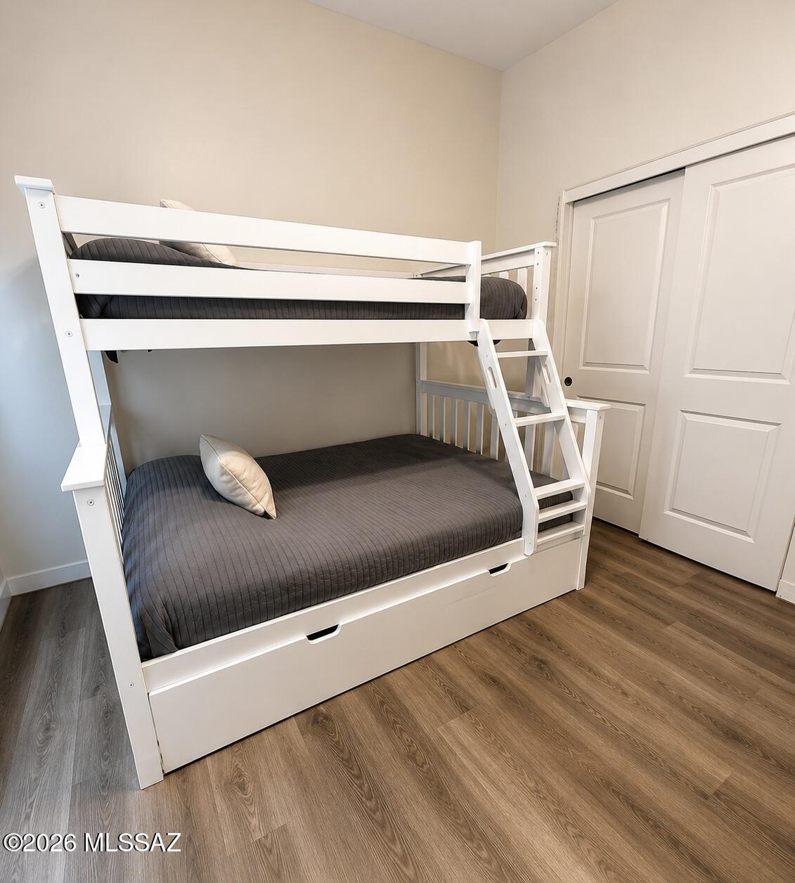 2018 East River Road, Unit 102 Tucson, AZ 85718 - Photo 14 of 25 a living room with a bed and white furniture