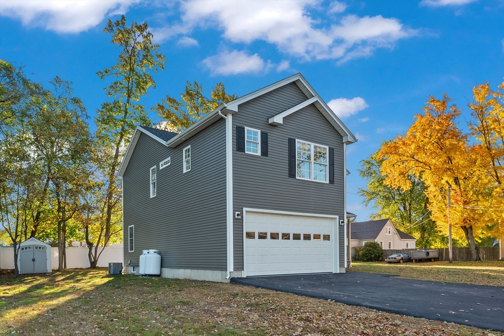 41 Glendale Street Chicopee, MA 01020 - Photo 3 of 42 a front view of a house with a yard