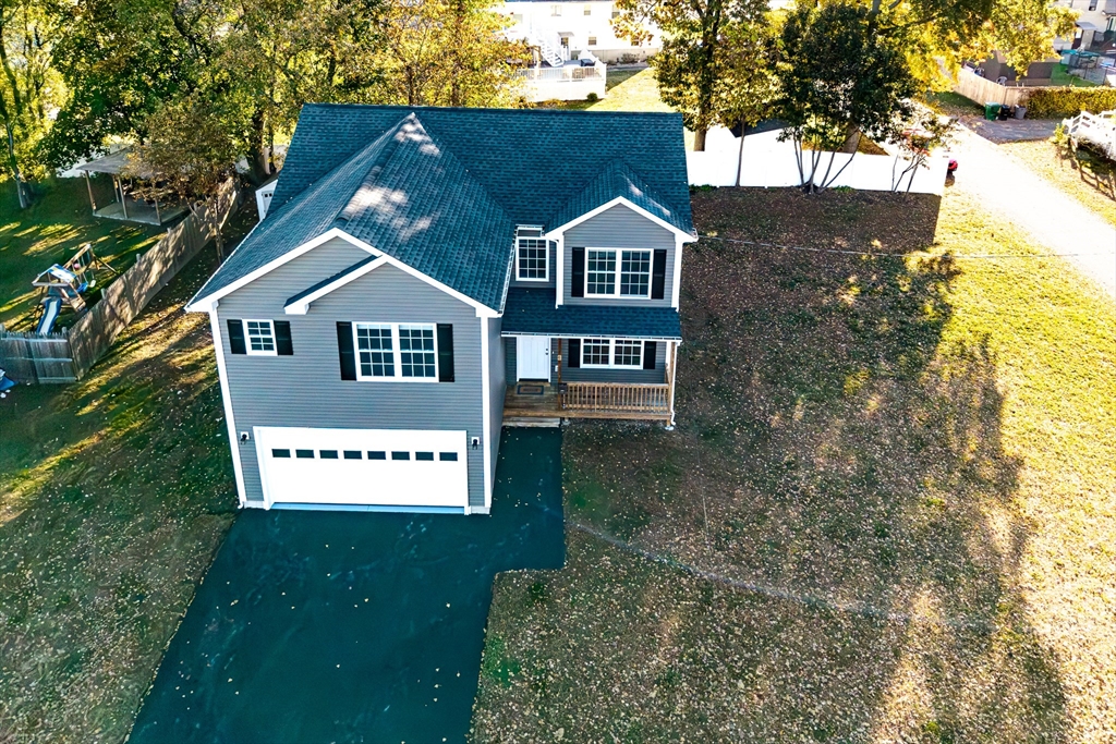 41 Glendale Street Chicopee, MA 01020 - Photo 38 of 42 a view of a house with a yard