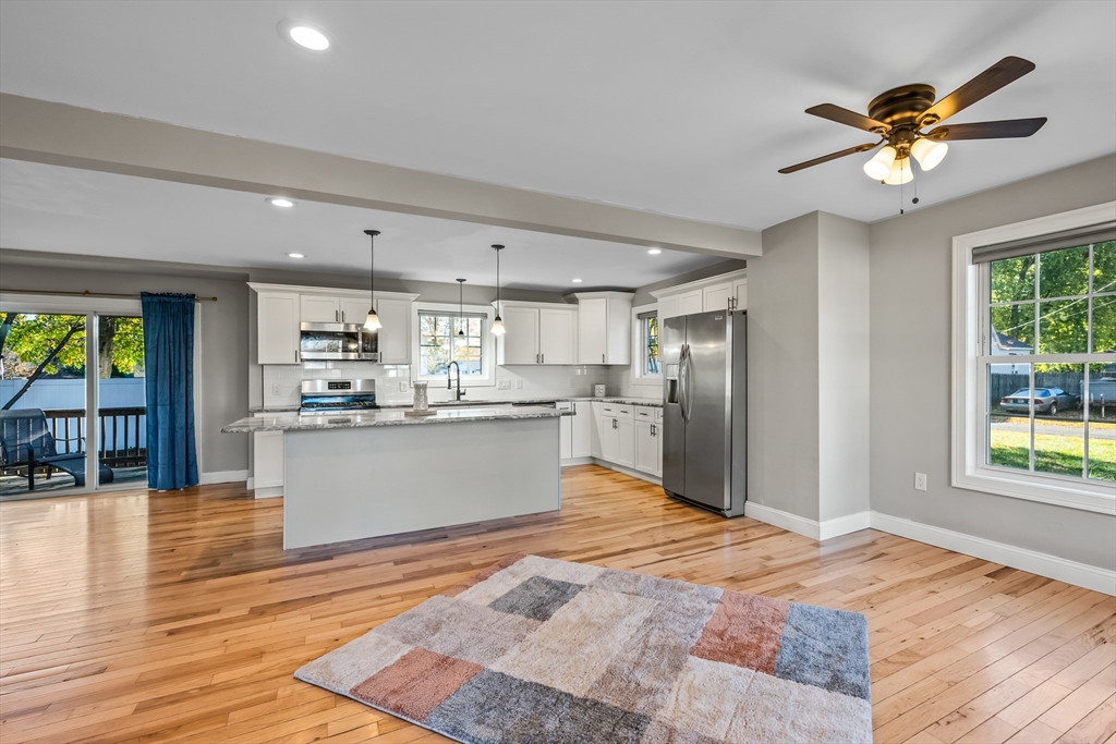 41 Glendale Street Chicopee, MA 01020 - Photo 5 of 42 a view of kitchen with granite countertop cabinets and refrigerator