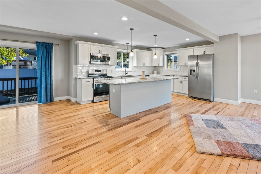 41 Glendale Street Chicopee, MA 01020 - Photo 8 of 42 a kitchen with stainless steel appliances granite countertop a refrigerator and a sink