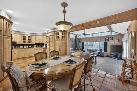 a kitchen with stainless steel appliances granite countertop a stove and a sink