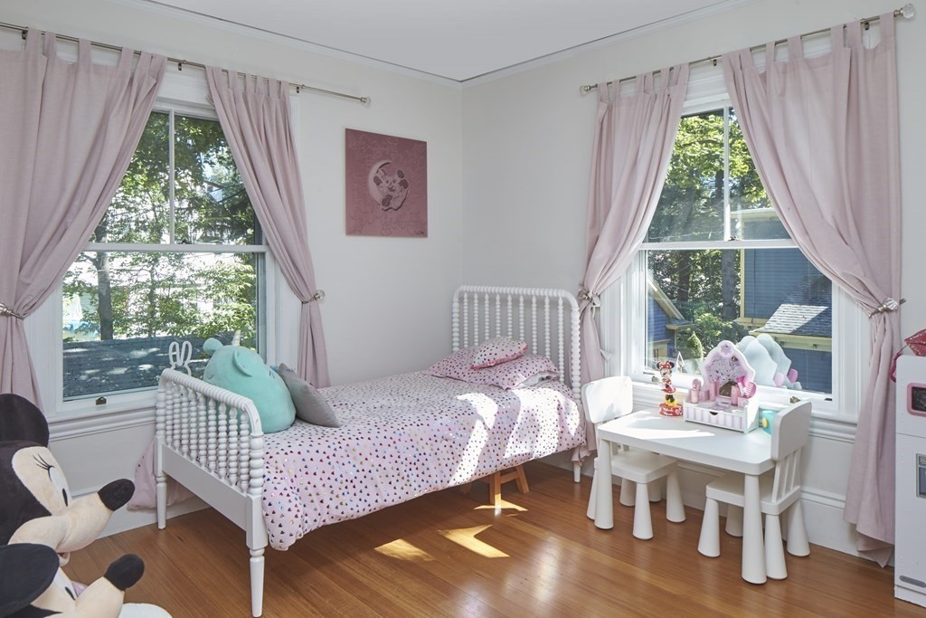 20 Orient Avenue Newton, MA 02459 - Photo 11 of 18 a bedroom with a bed and a window